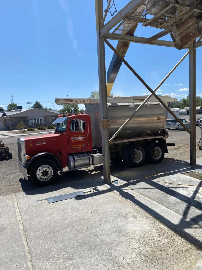 Home 5 A West Slope Farm & Ranch delivery truck being loaded with bulk supplies at our feed store Delta CO.